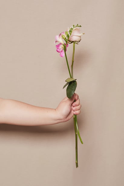 Woman Holding Flowers